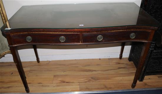 A Sheraton style mahogany serpentine table, W.137cm